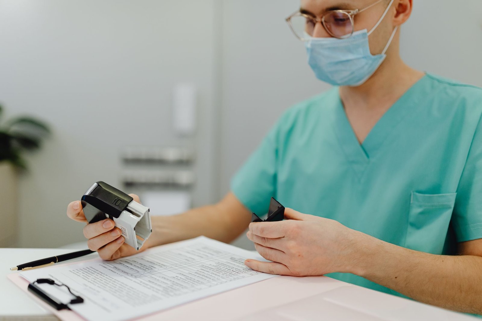 Dental billing team reviewing credentialing documents for a new associate dentist